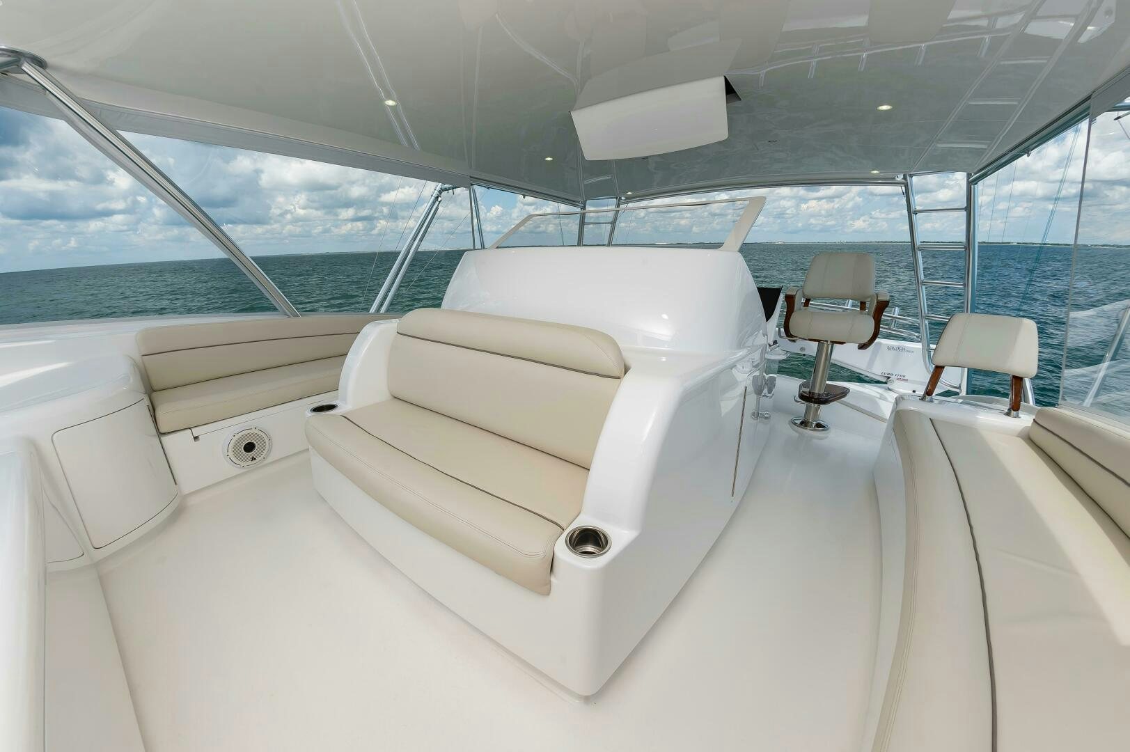 a white lounge chair on a white yacht aboard KNOT DONE YET Yacht for Sale