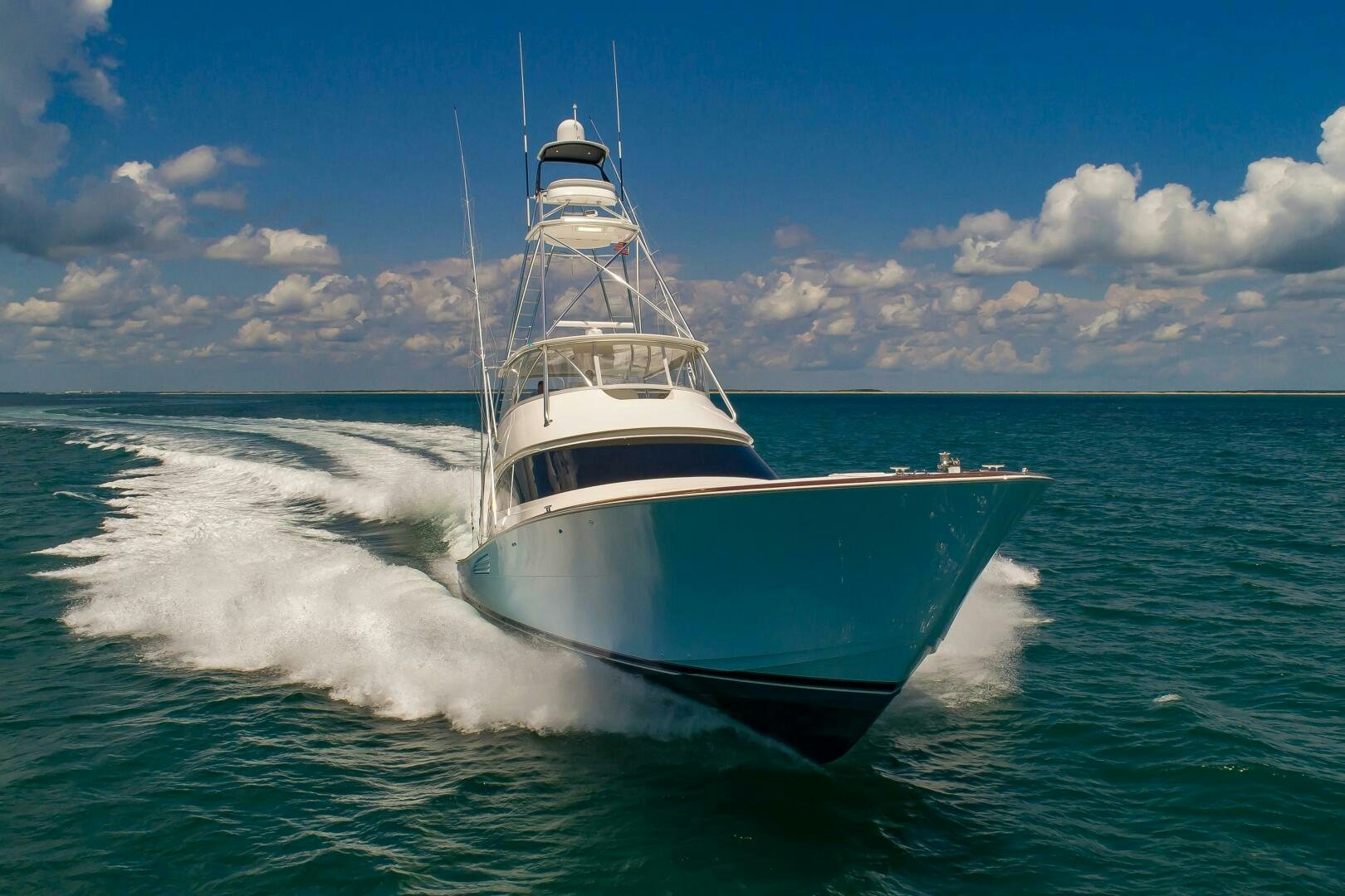 a boat on the water aboard KNOT DONE YET Yacht for Sale