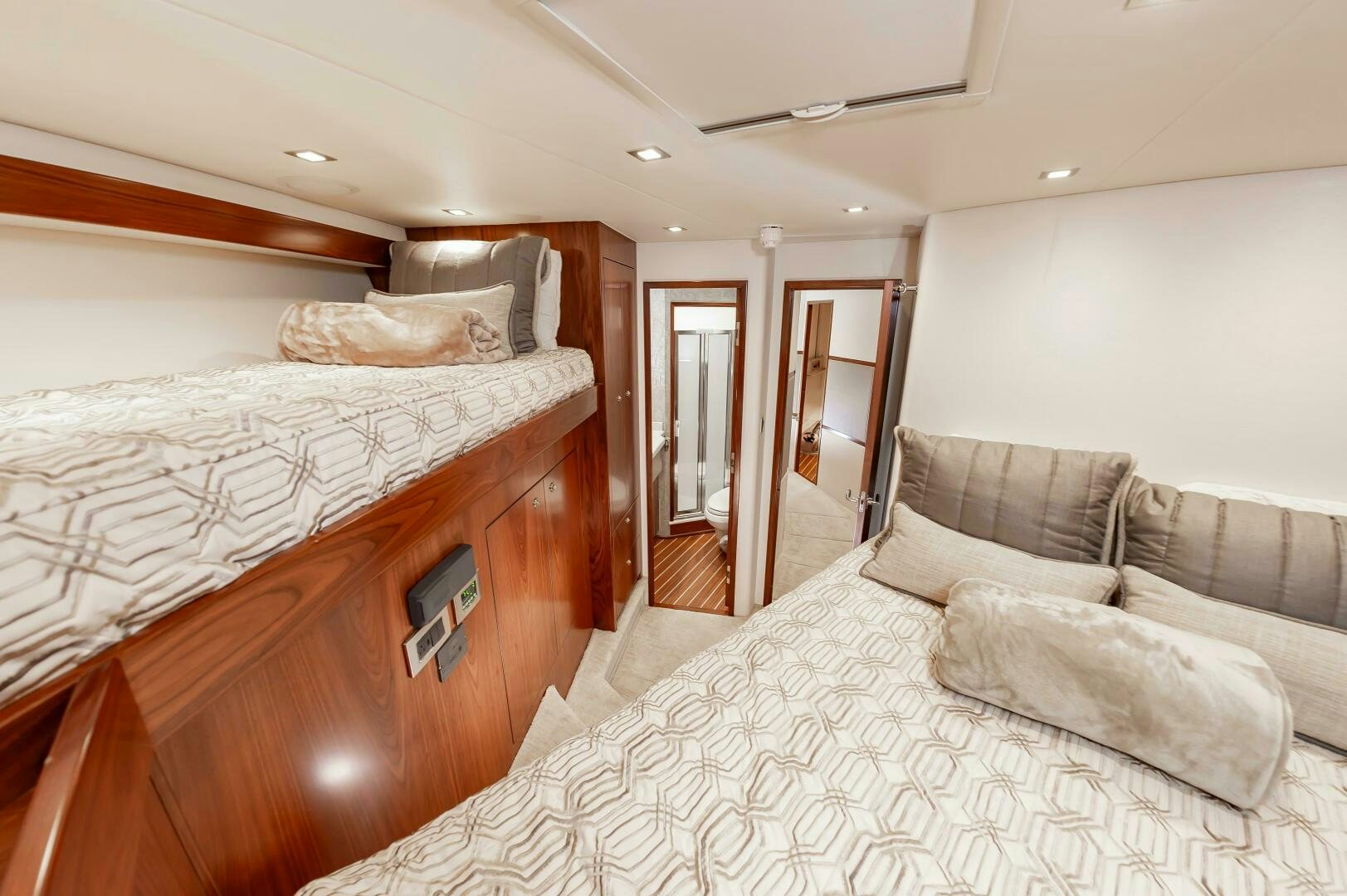 a bedroom with a bed and a couch aboard KNOT DONE YET Yacht for Sale