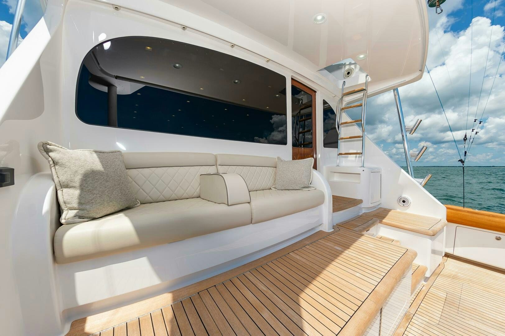 a white couch in a boat aboard KNOT DONE YET Yacht for Sale