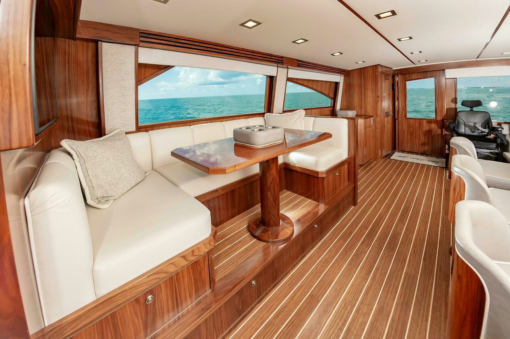 a living room with a couch and a table aboard KNOT DONE YET Yacht for Sale