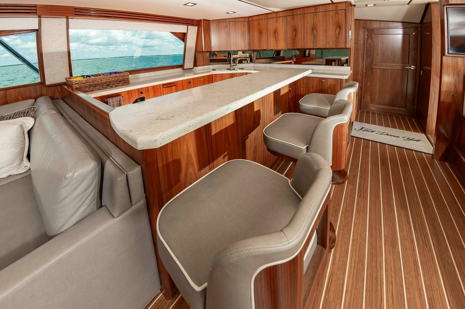 a room with a table and chairs aboard KNOT DONE YET Yacht for Sale