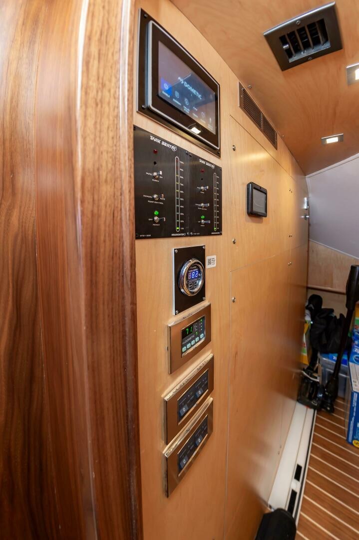 a tv on a wall aboard KNOT DONE YET Yacht for Sale
