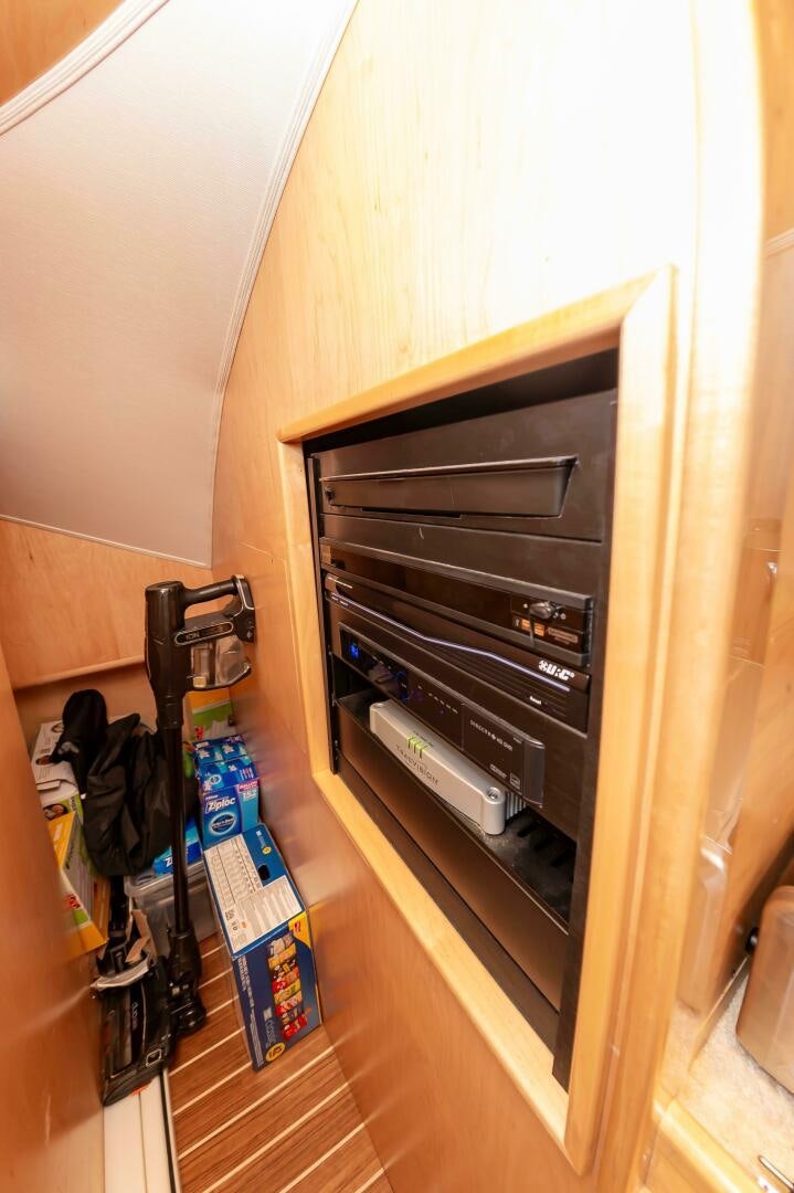 a wood cabinet with a vent aboard KNOT DONE YET Yacht for Sale