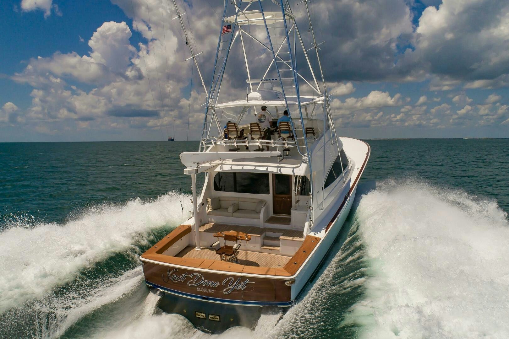 a boat on the water aboard KNOT DONE YET Yacht for Sale