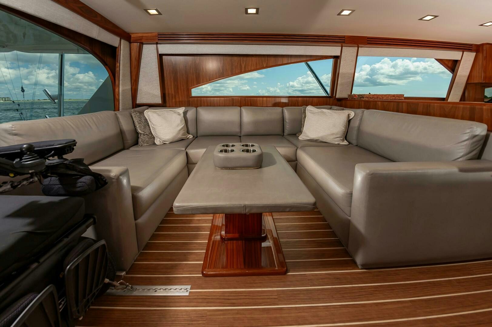 a living room with a large window aboard KNOT DONE YET Yacht for Sale