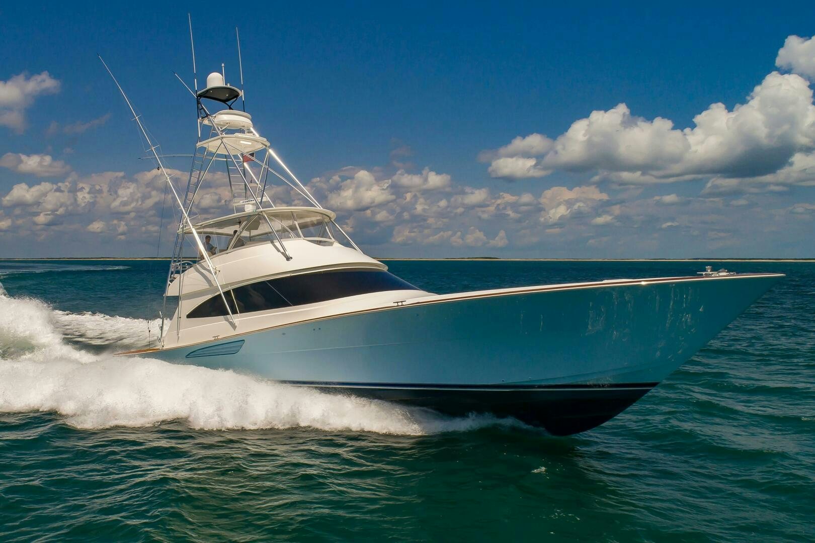 a boat on the water aboard KNOT DONE YET Yacht for Sale