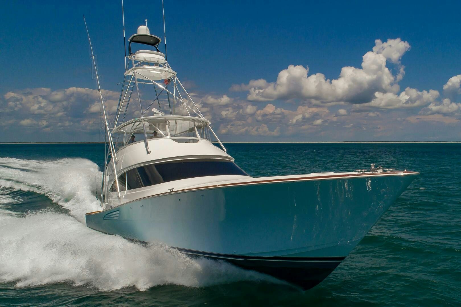 a boat on the water aboard KNOT DONE YET Yacht for Sale