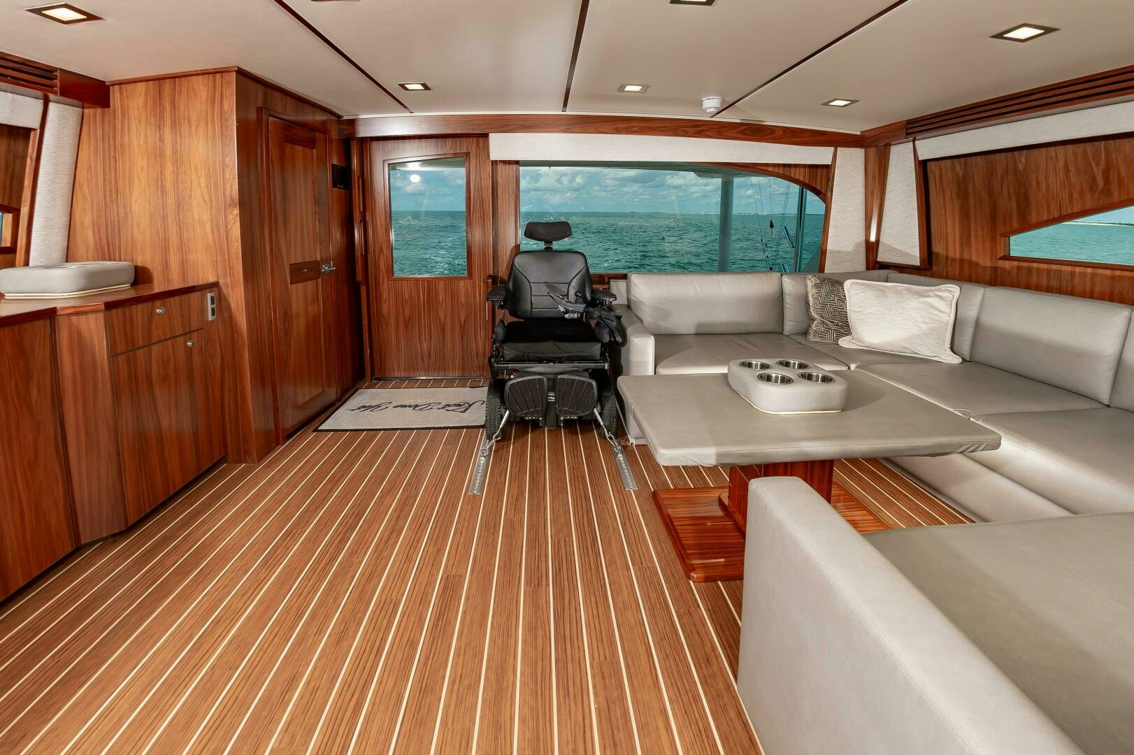 a room with a table and chairs aboard KNOT DONE YET Yacht for Sale