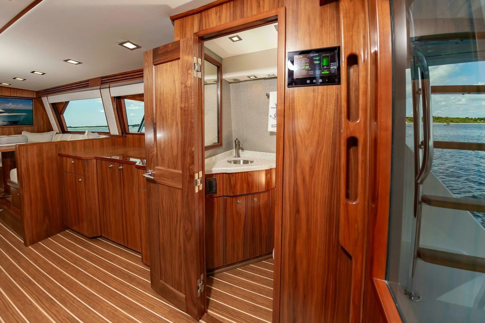 a room with wooden cabinets aboard KNOT DONE YET Yacht for Sale