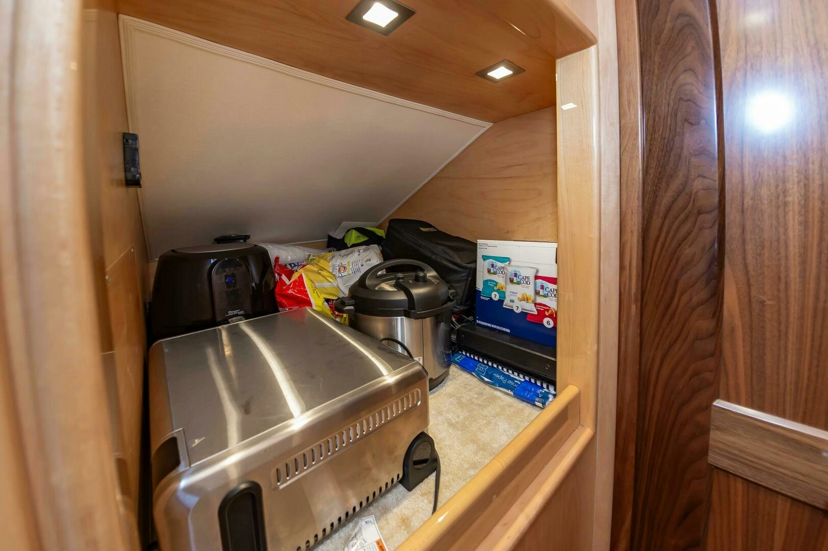 a kitchen with a lot of clutter on the counter aboard KNOT DONE YET Yacht for Sale