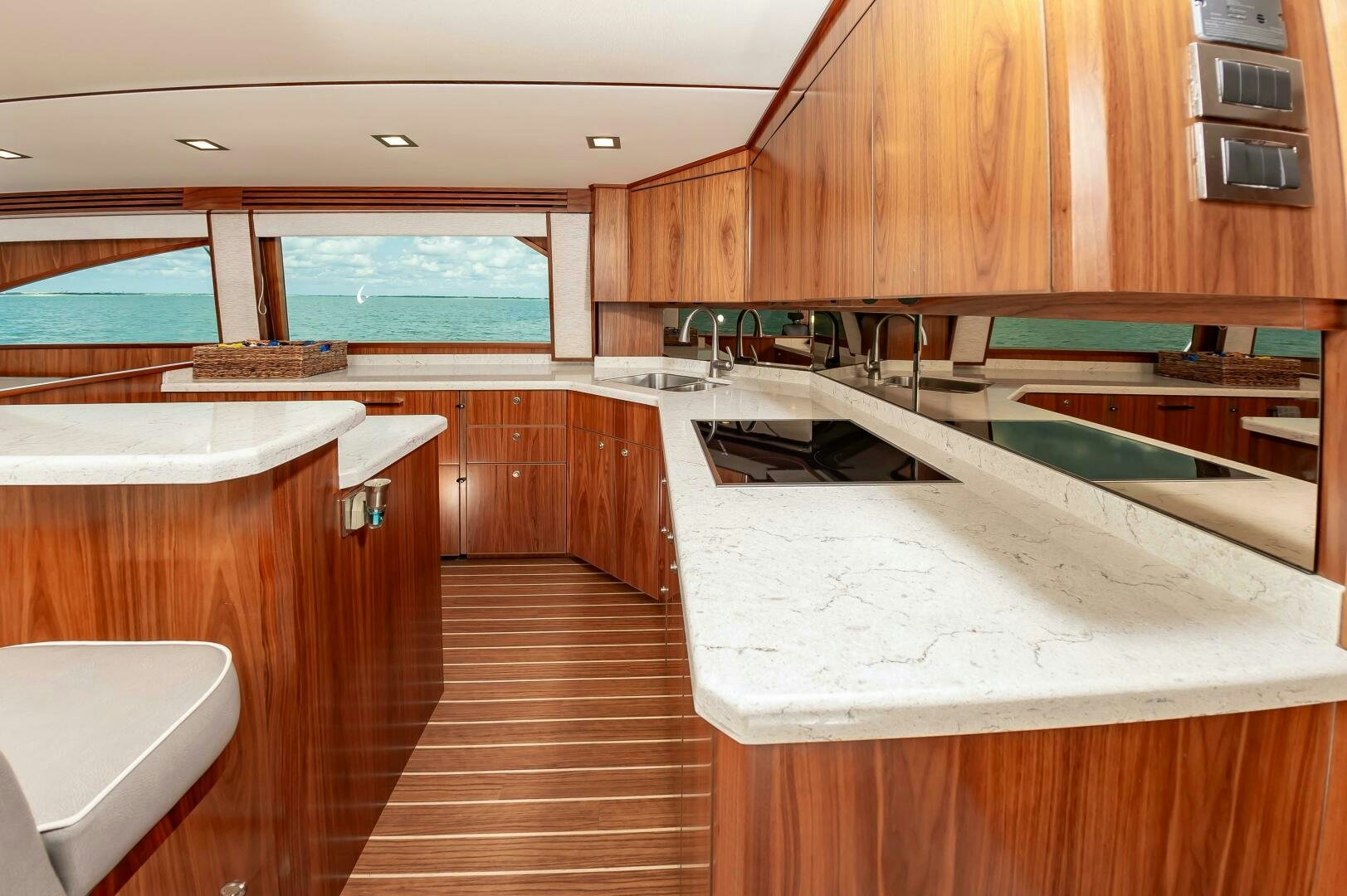 a kitchen with wooden cabinets aboard KNOT DONE YET Yacht for Sale