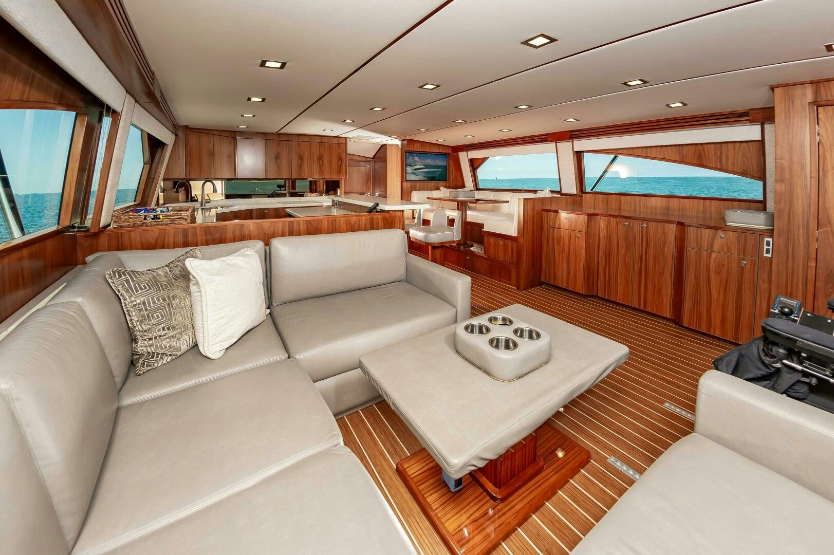 a living room with a couch and a table aboard KNOT DONE YET Yacht for Sale