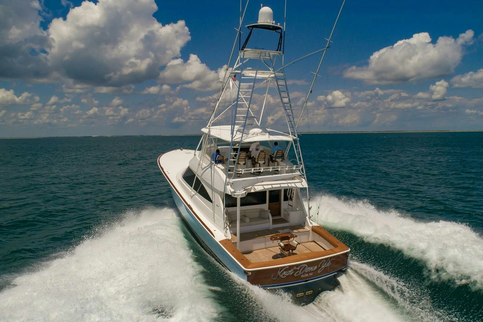 a boat on the water aboard KNOT DONE YET Yacht for Sale