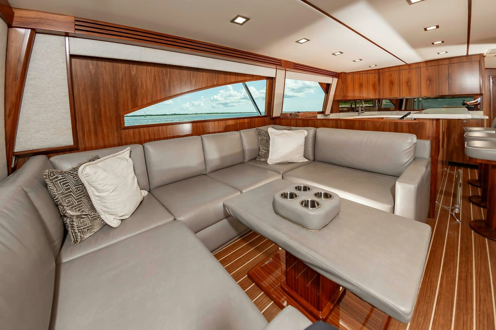 a living room with a couch and a table aboard KNOT DONE YET Yacht for Sale