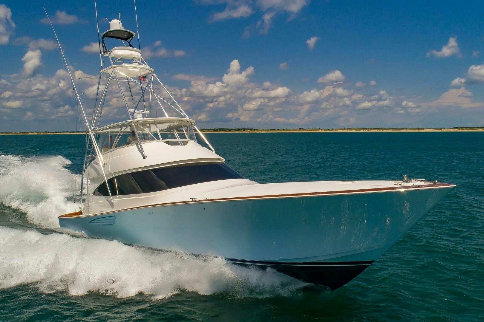 a boat on the water aboard KNOT DONE YET Yacht for Sale