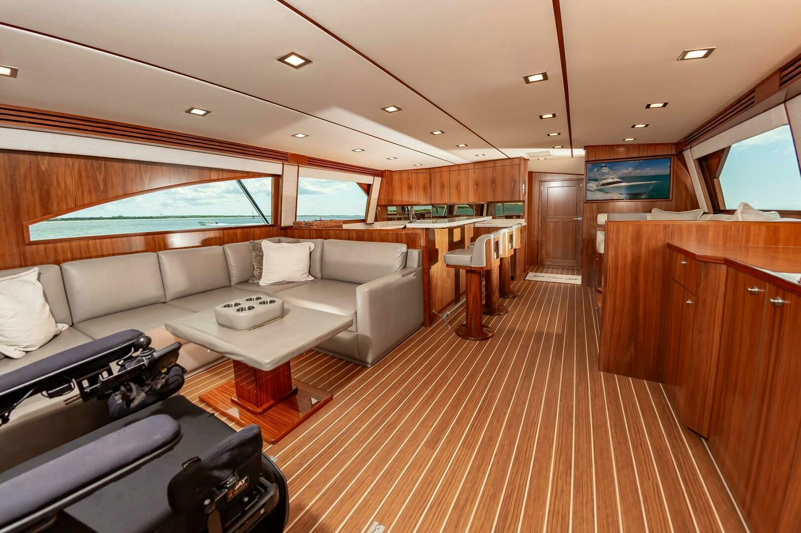 a living room with a couch and a table aboard KNOT DONE YET Yacht for Sale