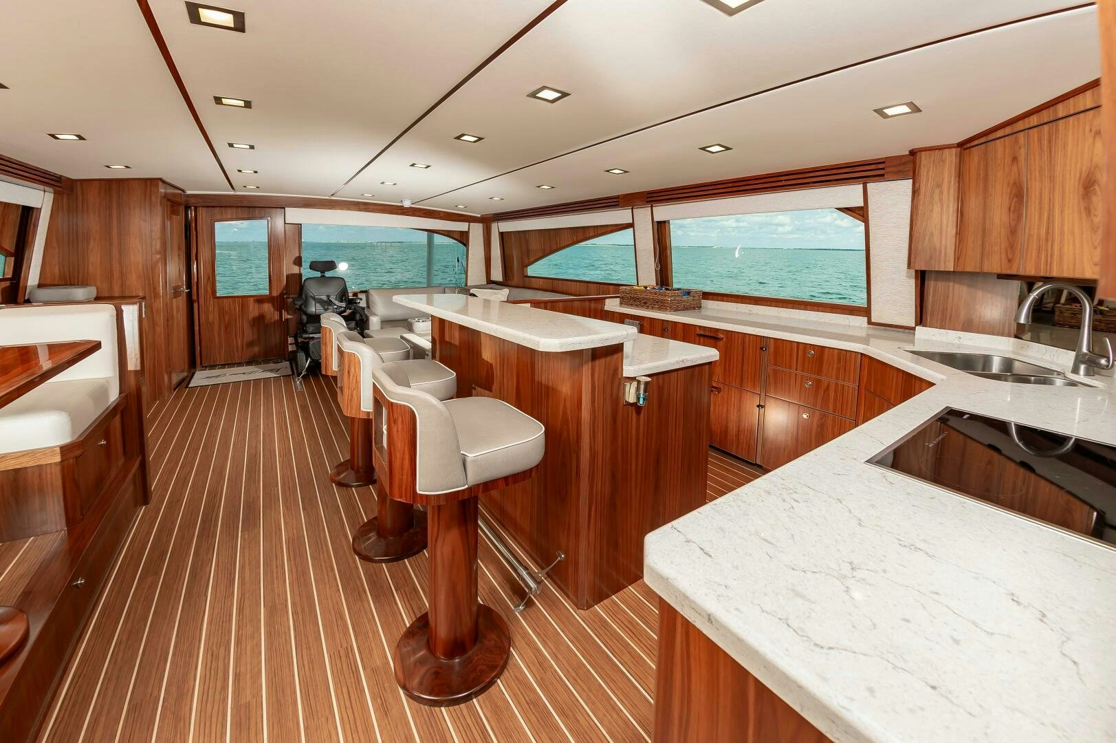 a kitchen with a wood floor aboard KNOT DONE YET Yacht for Sale