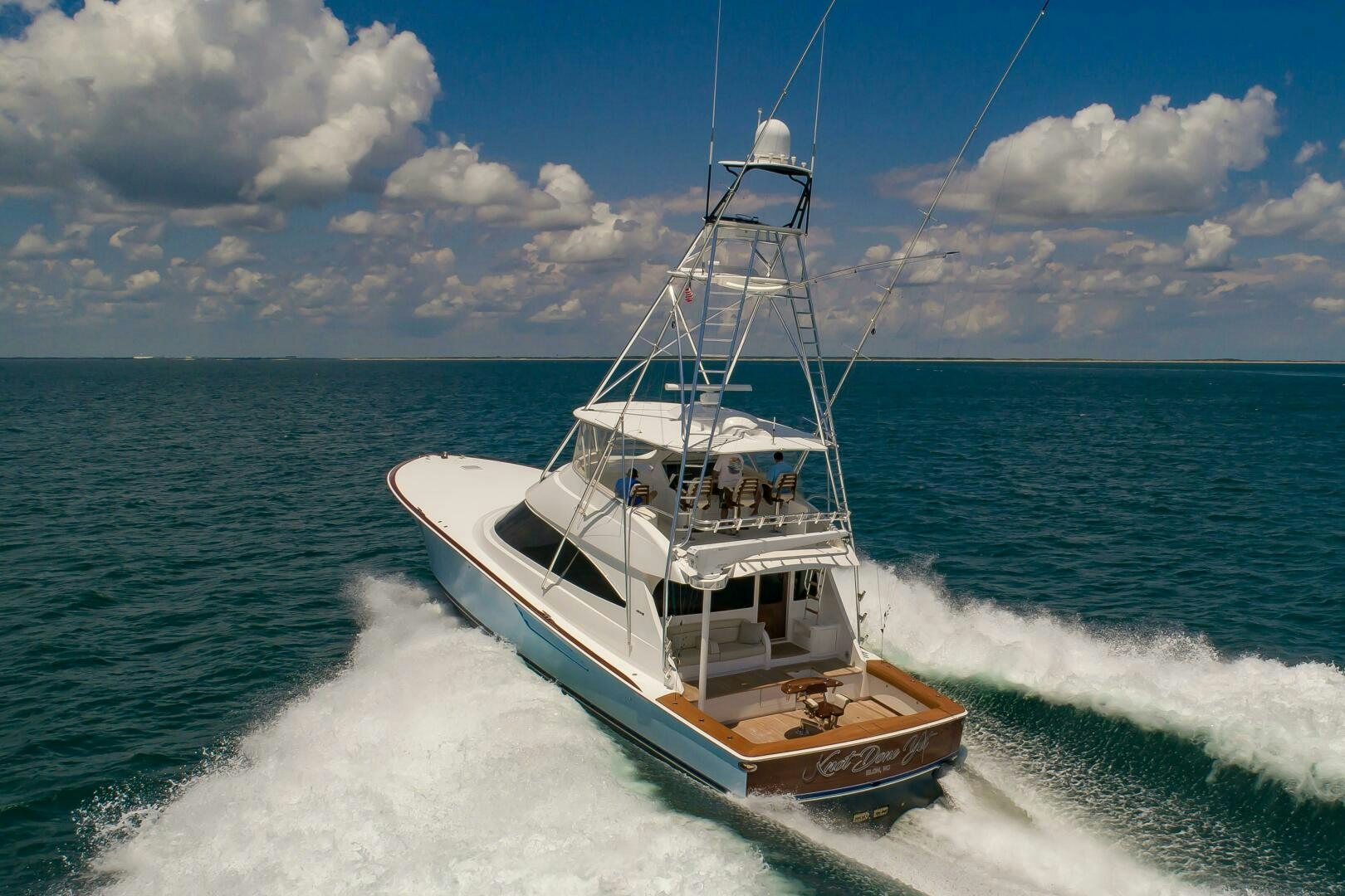 a boat on the water aboard KNOT DONE YET Yacht for Sale