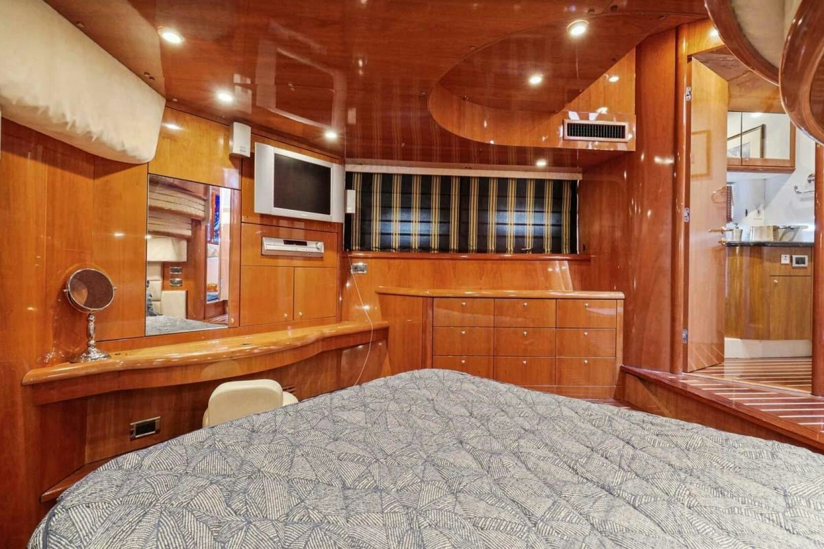a bed in a cabin aboard OBSESSION Yacht for Sale