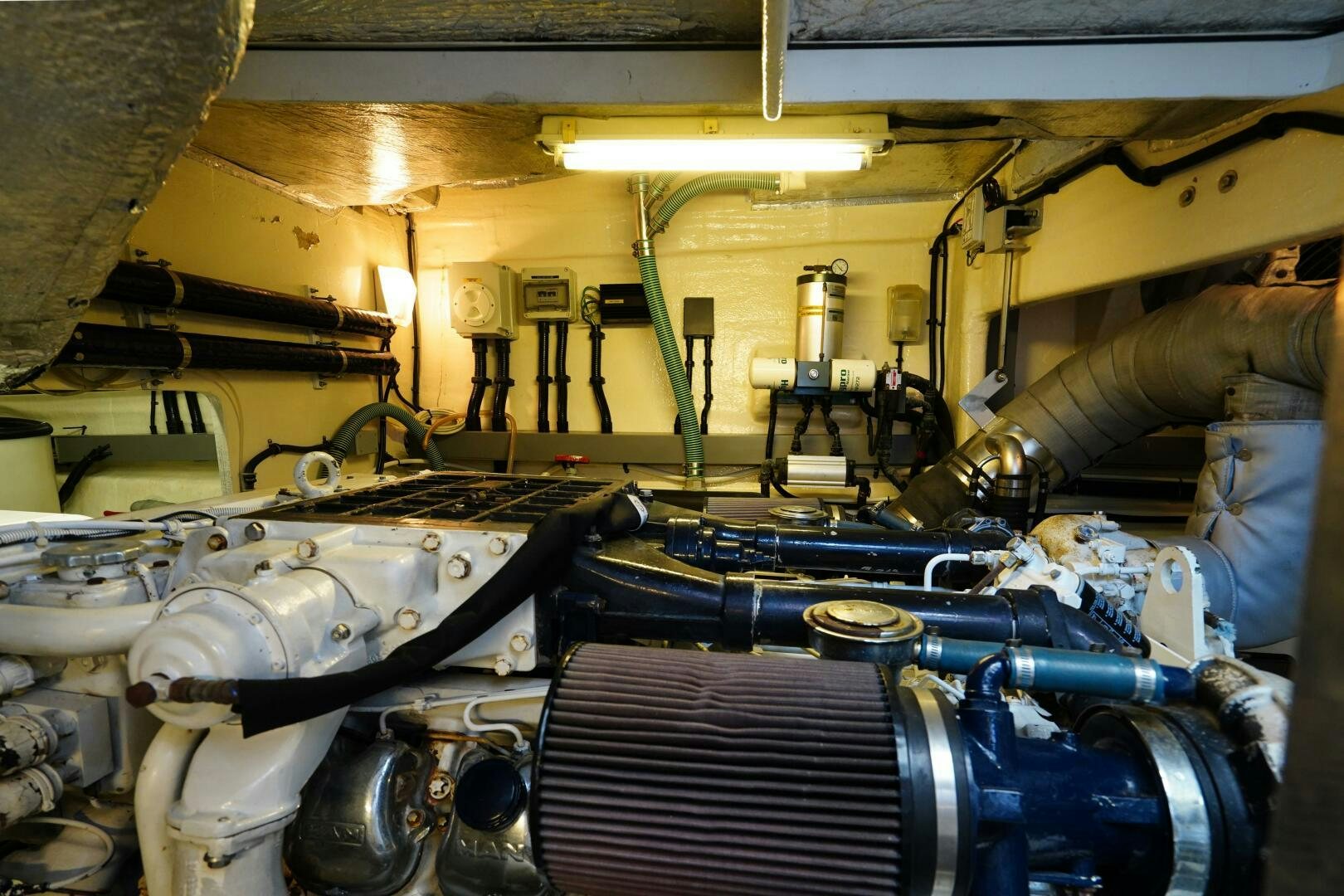 a large machine with pipes aboard OBSESSION Yacht for Sale