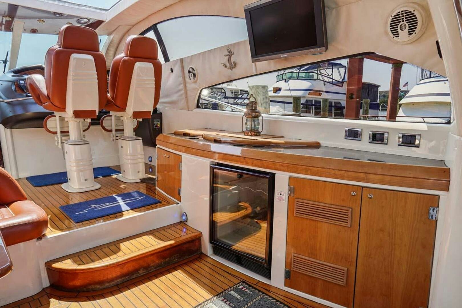 a kitchen with a stove and a microwave aboard OBSESSION Yacht for Sale
