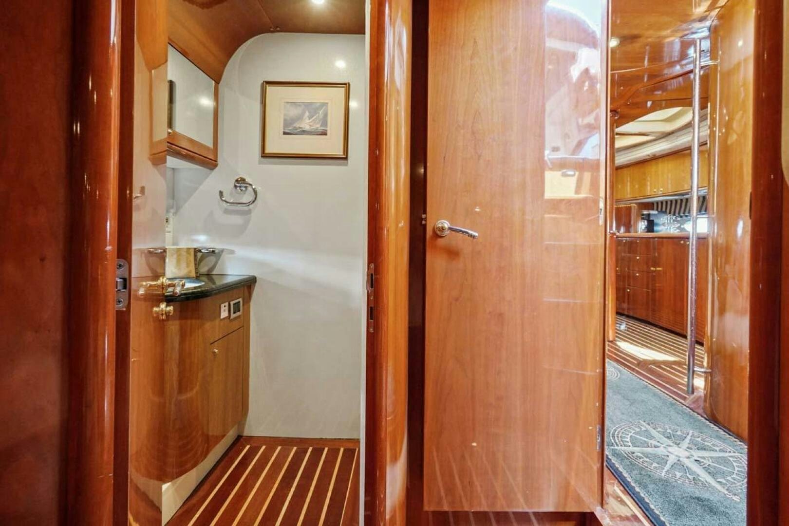 a room with wooden doors aboard OBSESSION Yacht for Sale