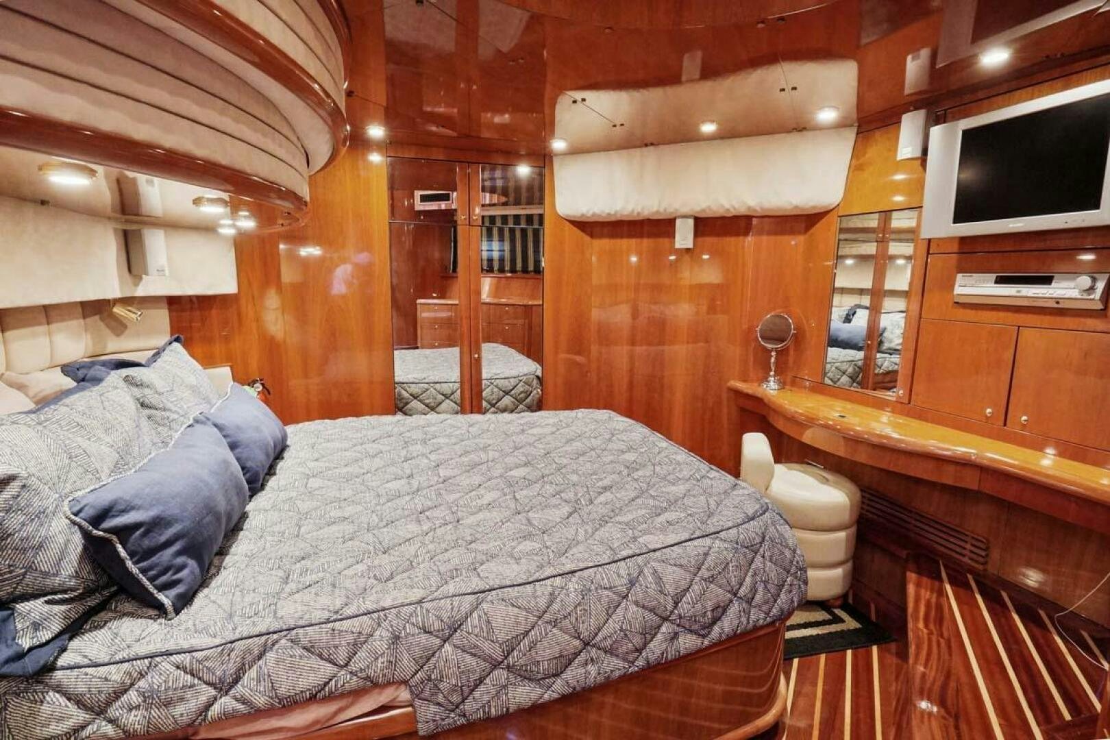 a bed in a cabin aboard OBSESSION Yacht for Sale