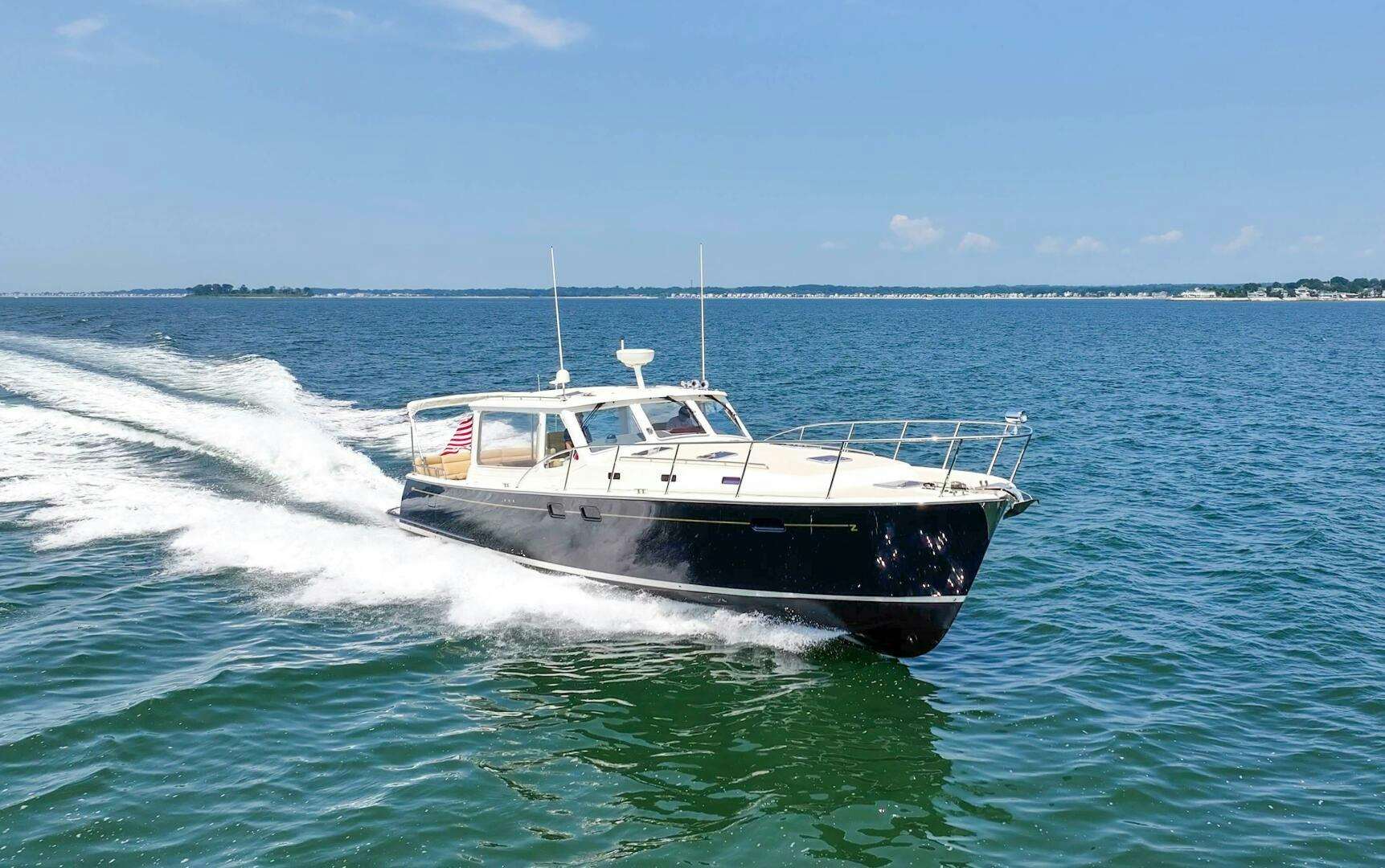 a boat on the water aboard HIGHLANDER Yacht for Sale