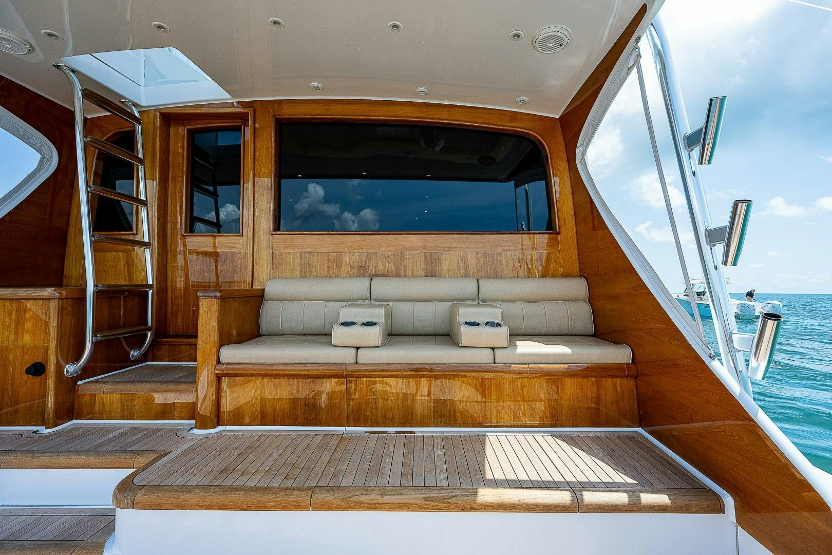 a boat on a water body aboard MAXIMUS Yacht for Sale