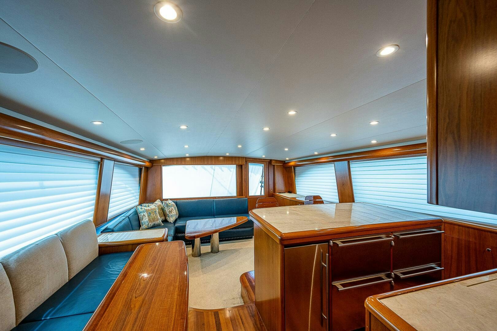 a living room with a couch and a table aboard MAXIMUS Yacht for Sale