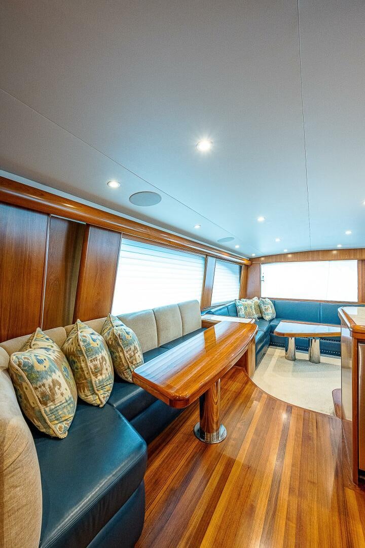 a living room with a couch and a table aboard MAXIMUS Yacht for Sale
