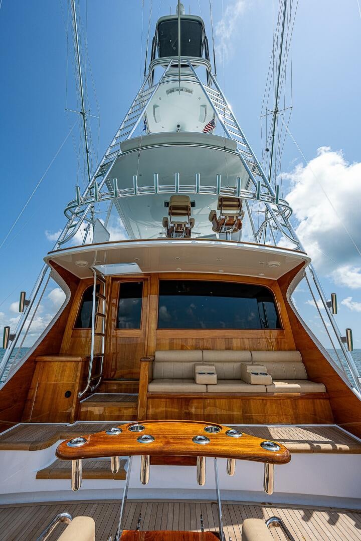 a wooden boat on a dock aboard MAXIMUS Yacht for Sale