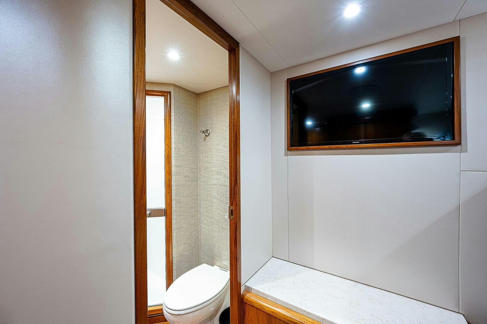 a bathroom with a glass shower aboard MAXIMUS Yacht for Sale