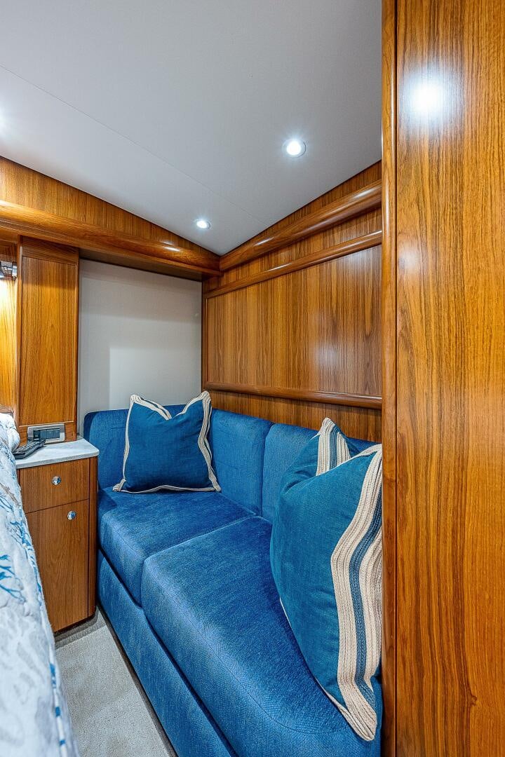 a couch in a room aboard MAXIMUS Yacht for Sale