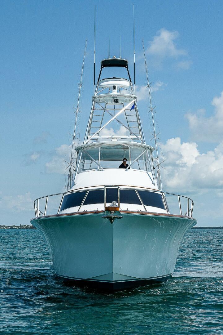 a white boat in the water aboard MAXIMUS Yacht for Sale