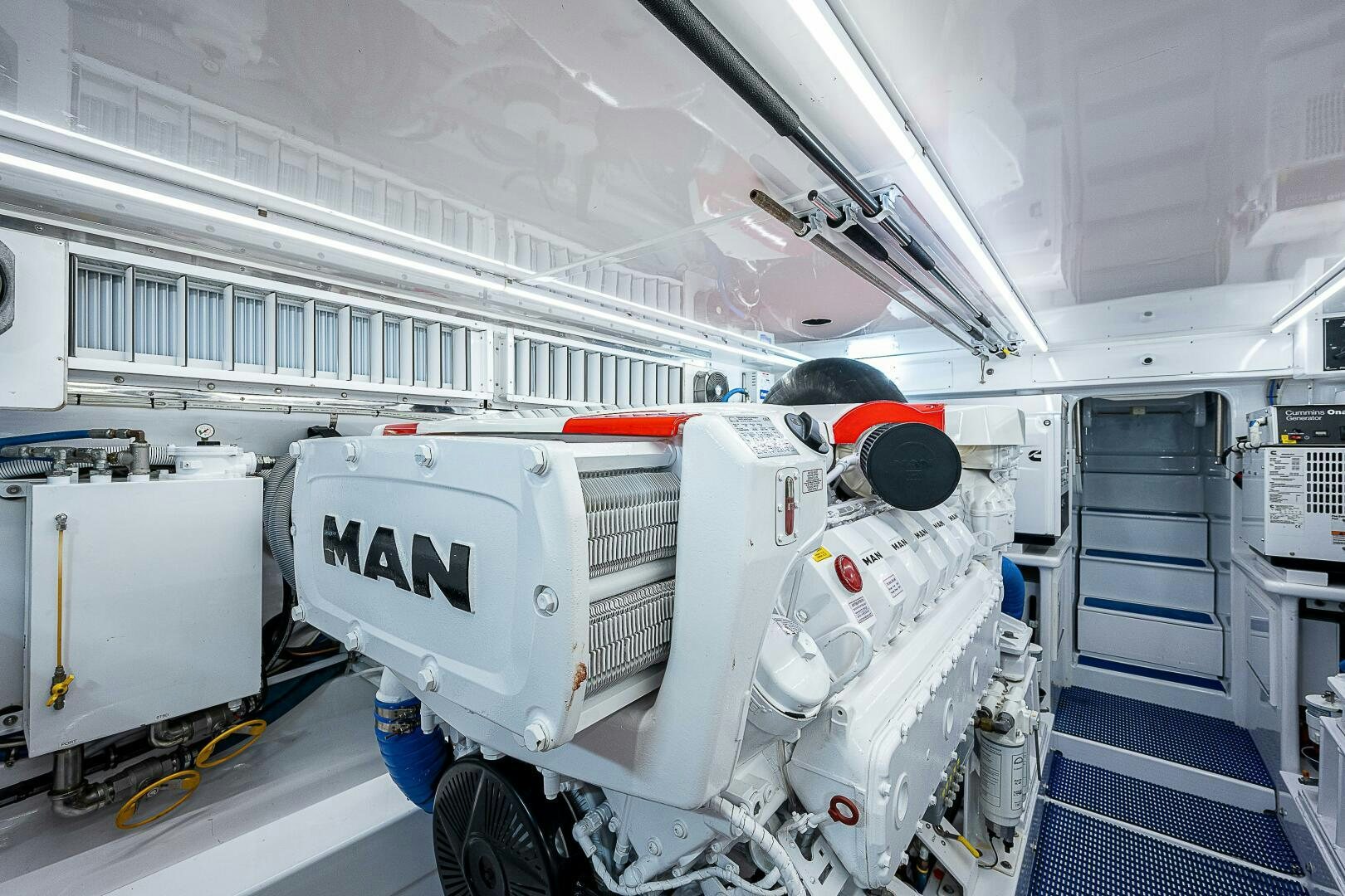 a white truck with a red light on the back aboard MAXIMUS Yacht for Sale