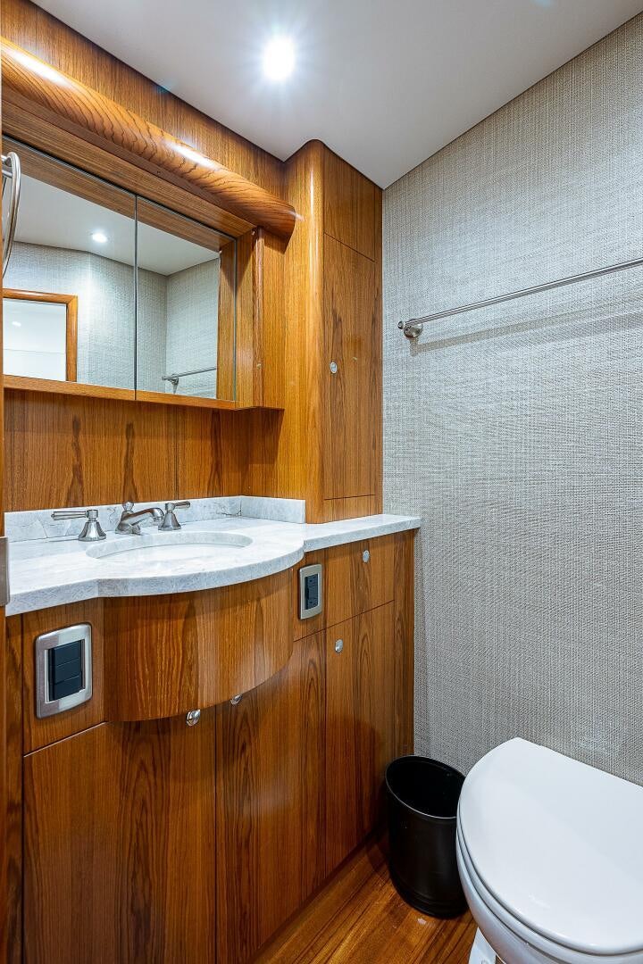 a bathroom with a sink and a toilet aboard MAXIMUS Yacht for Sale