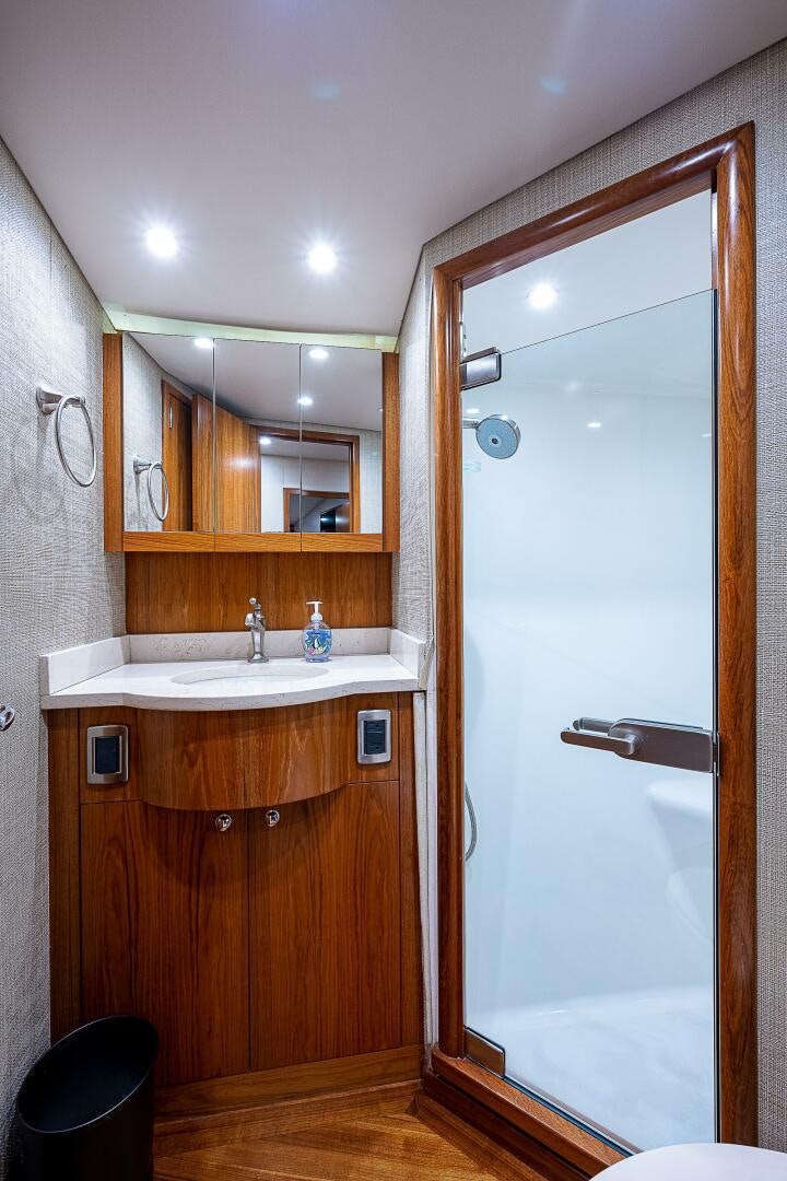 a bathroom with a sink and mirror aboard MAXIMUS Yacht for Sale