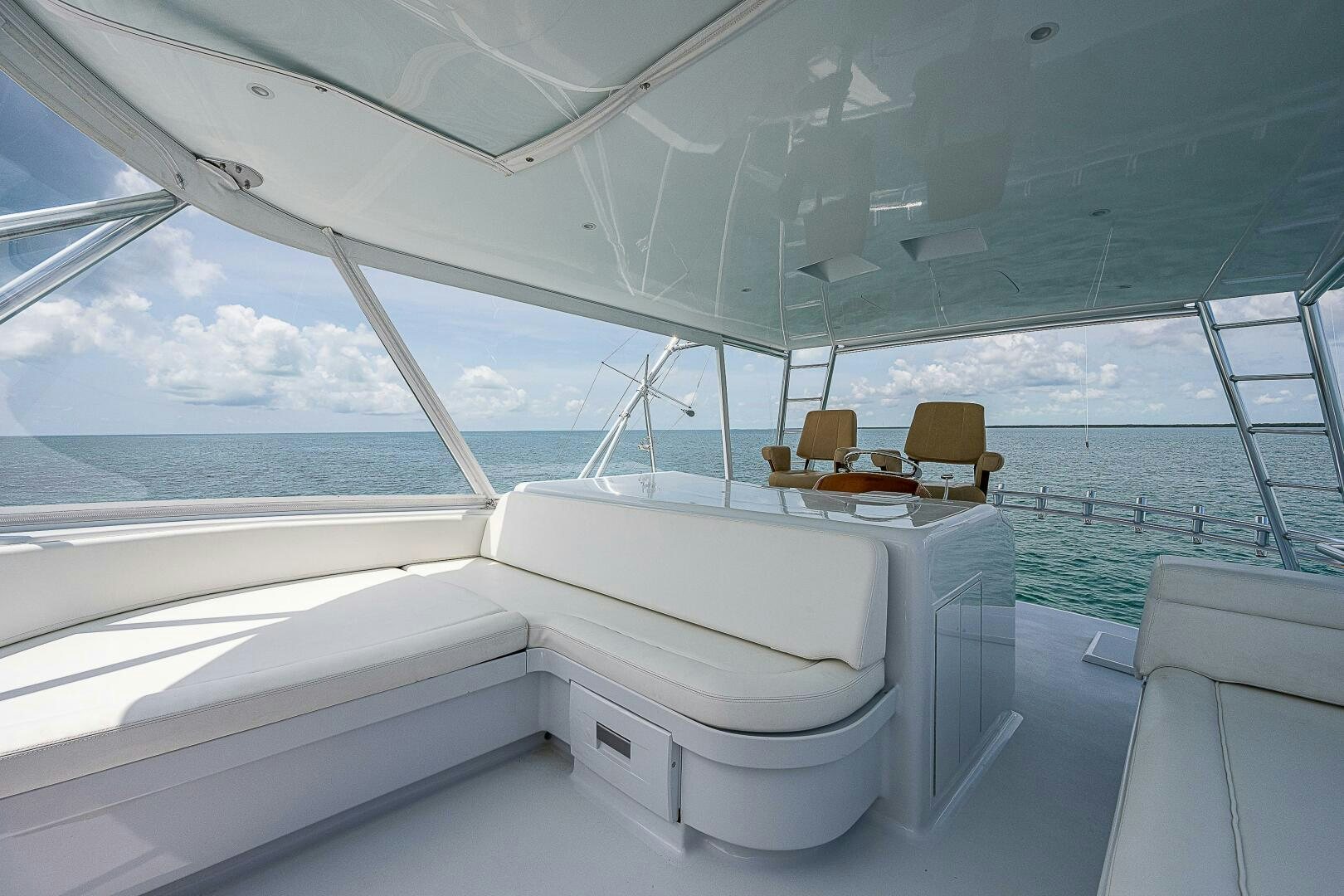 a room with a bed and a chair aboard MAXIMUS Yacht for Sale