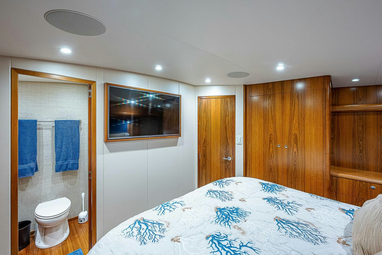 a bedroom with a large bed aboard MAXIMUS Yacht for Sale
