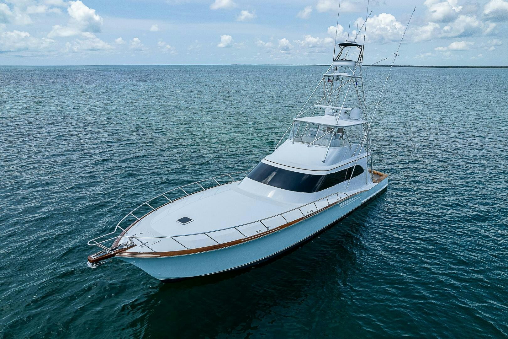 a white boat in the water aboard MAXIMUS Yacht for Sale
