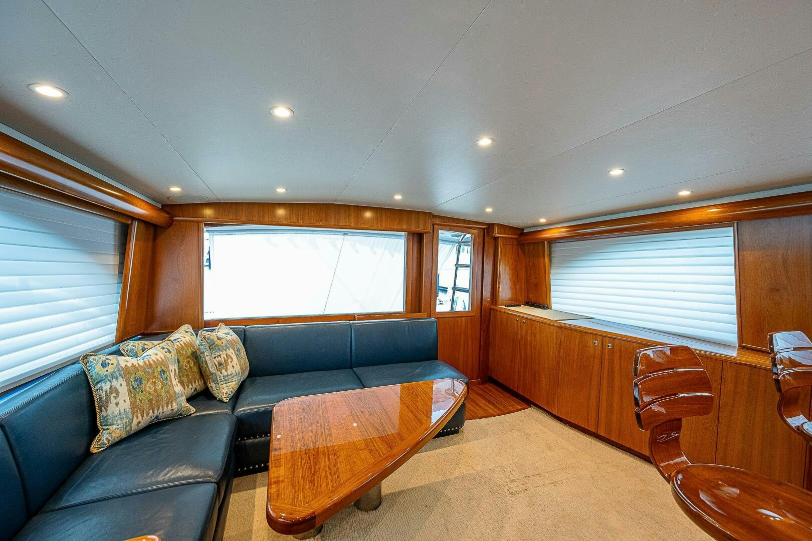 a living room with a leather couch aboard MAXIMUS Yacht for Sale