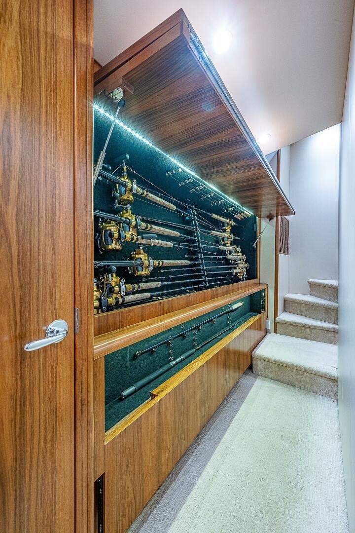 a wooden cabinet with a shelf aboard MAXIMUS Yacht for Sale