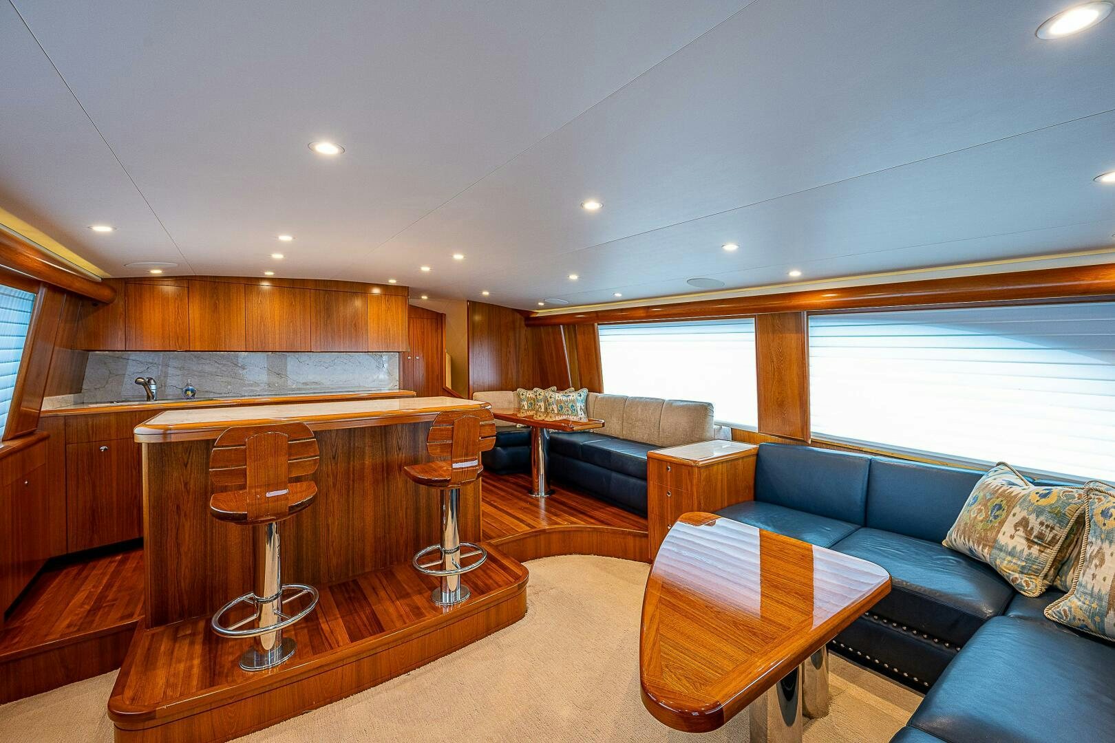 a living room with a couch and a table aboard MAXIMUS Yacht for Sale