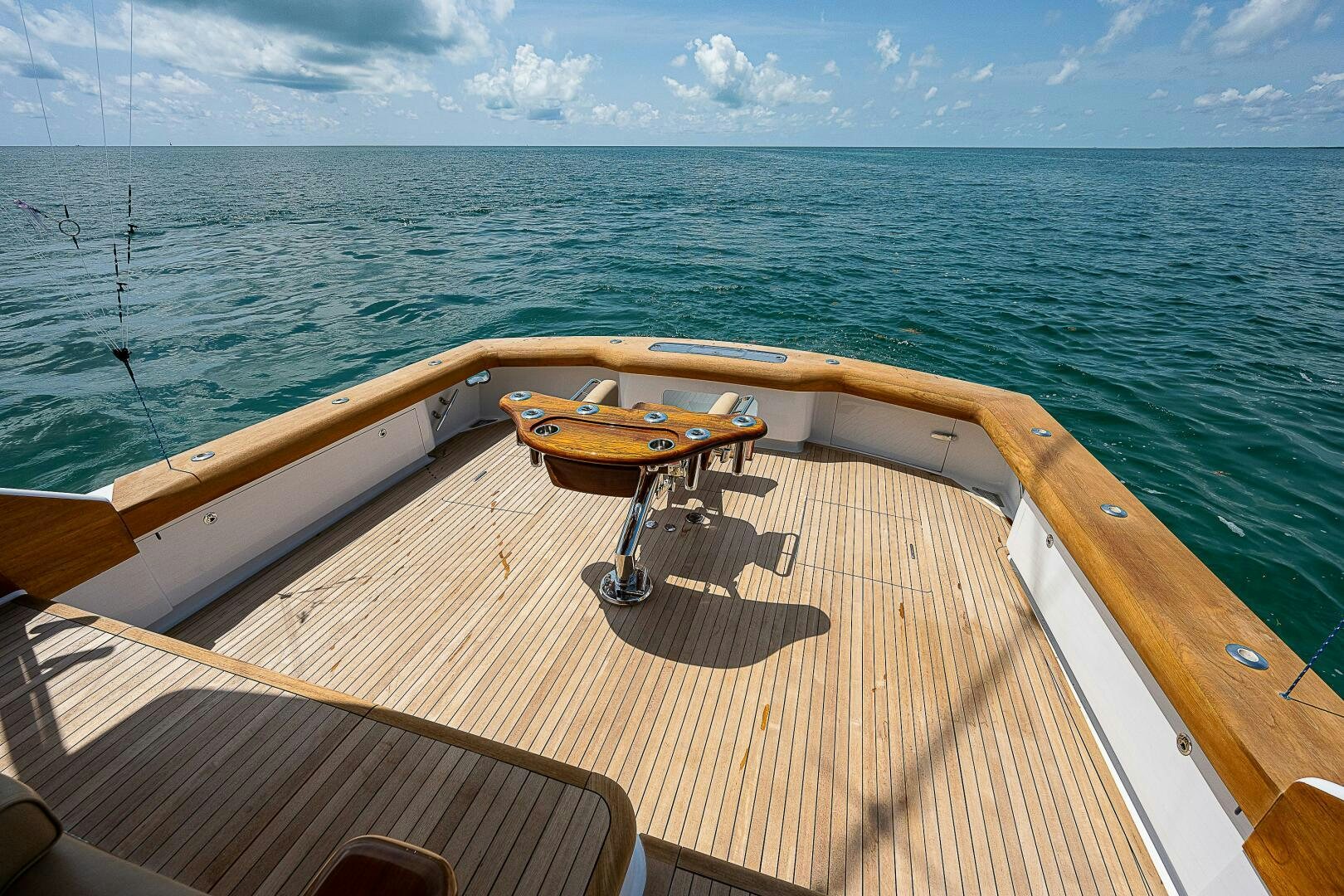 a wooden boat on the water aboard MAXIMUS Yacht for Sale