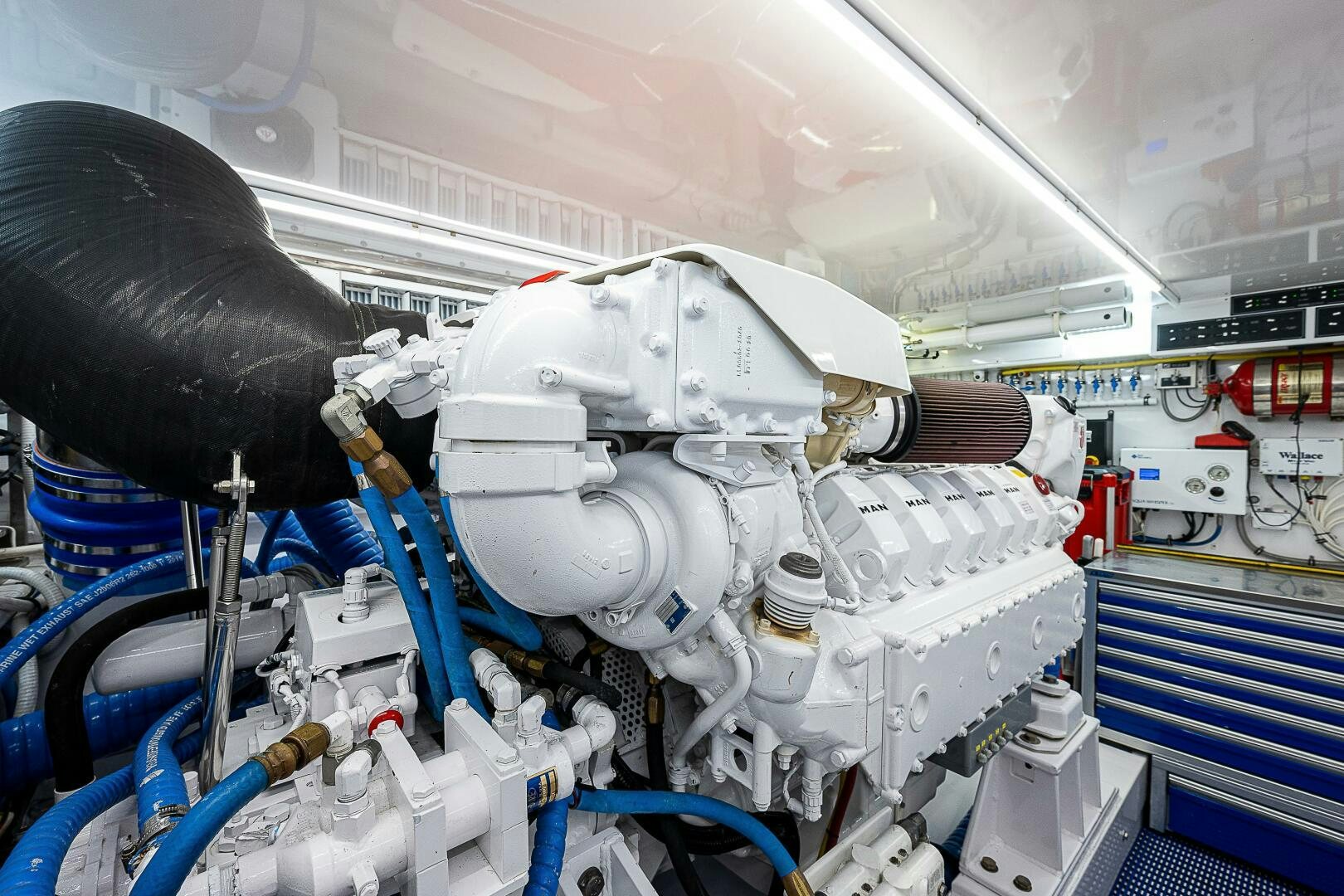 a machine with a large metal cylinder aboard MAXIMUS Yacht for Sale