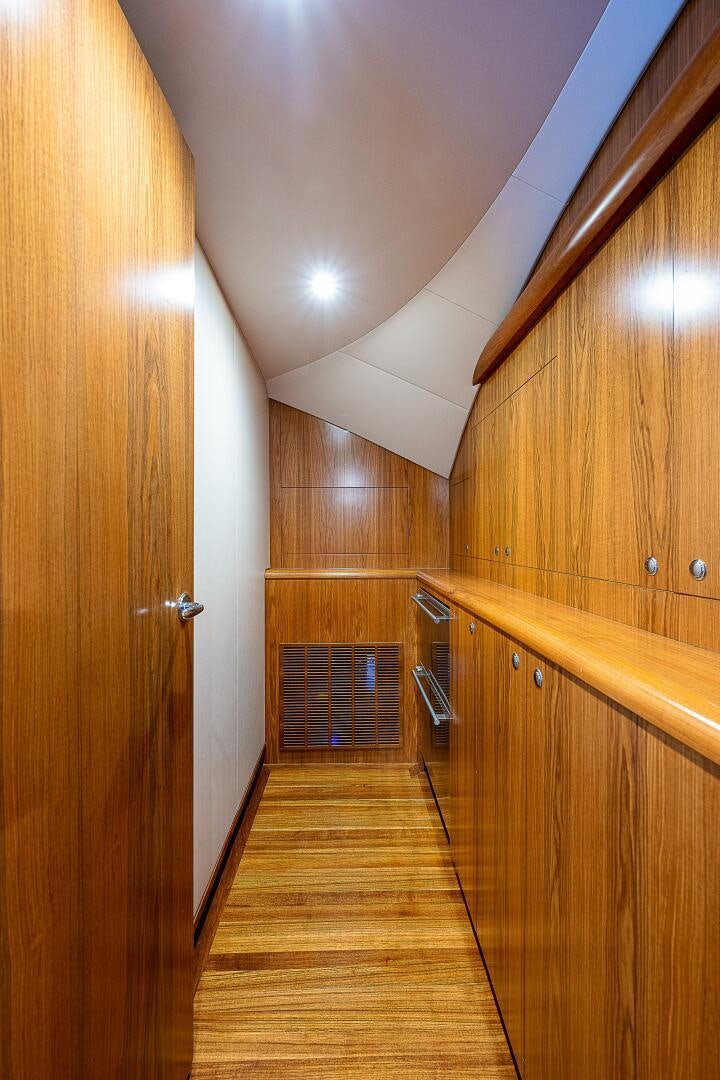 a long wooden hallway aboard MAXIMUS Yacht for Sale