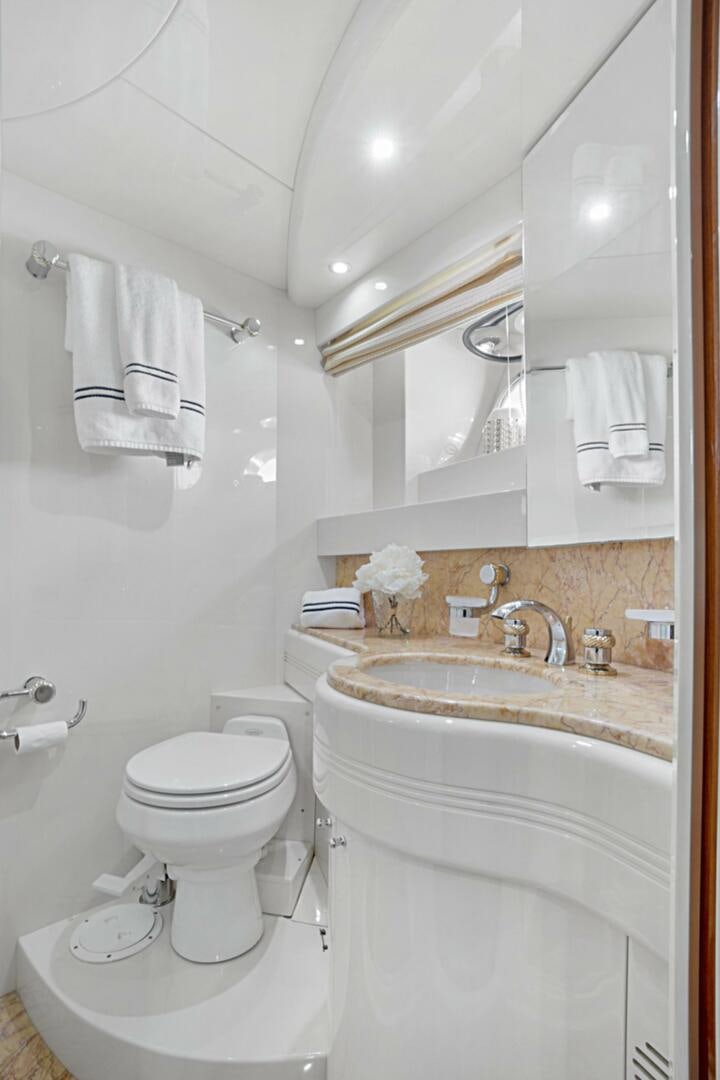 a bathroom with a toilet sink and a bathtub aboard SUN ADVENTURES Yacht for Sale