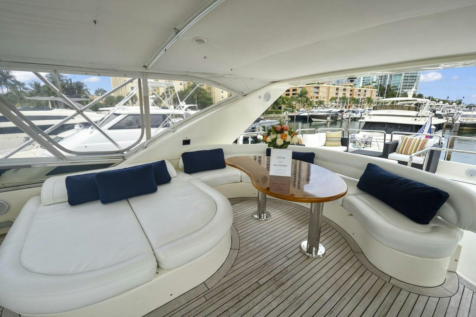 a room with a table and chairs aboard SUN ADVENTURES Yacht for Sale